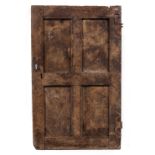 A SMALL GEORGIAN COUNTRY MADE OAK PANELLED CUPBOARD DOOR 56cm wide x 92cm high