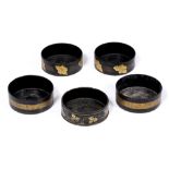 TWO PAIRS OF REGENCY BLACK LACQUERED WINE BOTTLE COASTERS each approximately 13.5cm diameter x 5cm