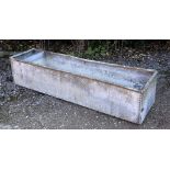 AN OLD GALVANIZED RECTANGULAR WATER TROUGH OR PLANTER of riveted construction, 184cm long x 49cm