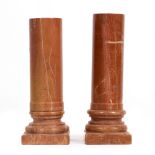 TWO SIMILAR GRAND TOUR STYLE SMALL TURNED MARBLE PLINTHS of classical column form, the largest 10.