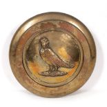 A HEAVY CAST BRONZE ROUNDEL depicting a crest of a lady's head on a birds body, 43cm diameter x 4.