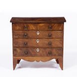 A VICTORIAN MAHOGANY MINIATURE CHEST of two short and three long drawers, 37.5cm wide x 17cm deep