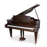 A BECHSTEIN MAHOGANY BOUDOIR GRAND PIANO NO. 64100 standing on square tapering legs and brass