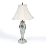 A GLASS MILLE FLEUR TYPE TABLE LAMP of baluster form with spreading base, indistinctly signed