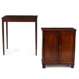 A LATE VICTORIAN MAHOGANY CUPBOARD with twin panel doors opening to reveal two shelves, all raised