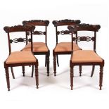 A SET OF FOUR WILLIAM IV ROSEWOOD BAR BACKED DINING CHAIRS with upholstered inset seats and turned