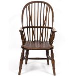 A LATE 19TH CENTURY ASH AND ELM WINDSOR ARMCHAIR by J.W.Webb having a spindle back and turned