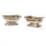 A LARGE PAIR OF GEORGIAN SILVER SALTS possible marks for London 1821, 9.5cm x 7cm x 4.5cm,