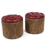 A PAIR OF RED LEATHER BUTTON UPHOLSTERED CYLINDRICAL STOOLS each 51cm diameter x 46cm high Ex