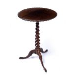 A WILLIAM IV ROSEWOOD TRIPOD TABLE in the manor of Gillow's of Lancaster, the circular top with