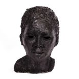 A CERAMIC SCULPTURE depicting a female head, 19cm x 31cm Condition: some minor surface scratches