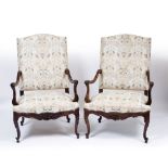 A PAIR OF 19TH CENTURY FRENCH LOUIS XV STYLE WALNUT ARMCHAIRS of large proportions and