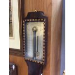 A GEORGE III MAHOGANY STICK BAROMETER by J & W Watkins, Charring Crofs, 11.5cm wide x 95.5cm high