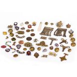 A GROUP OF MILITARY BUTTONS AND BADGES to include seven large brass Royal Engineers buttons,
