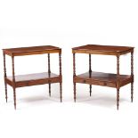 A PAIR OF MAHOGANY TWO TIER SIDE TABLES each with a single drawer with brass ring handles and raised