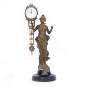 EARLY 20TH CENTURY SPELTER FIGURAL MYSTERY CLOCK with circular Arabic dial above pendulum 35cm in