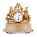 A LATE 19TH CENTURY FRENCH GILT METAL AND ALABASTER MANTLE CLOCK the enamel dial with arabic