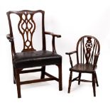 A 19TH CENTURY OPEN ARMCHAIR with a black leather upholstered seat and square legs together with a