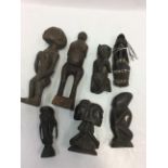 A GROUP OF MOSTLY EAST AFRICAN WOODEN DOLLS AND FIGURES At present, there is no condition report