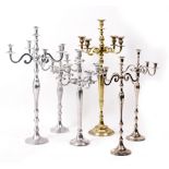 EIGHT CONTEMPORARY METAL FIVE BRANCH CANDELABRA the largest 100cm in height Ex property of The