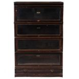 AN EARLY 20TH CENTURY OAK FOUR TIER GLOBE WERNICKE BOOKCASE 87cm wide x 28cm deep x 135cm high