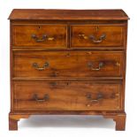 A 20TH CENTURY YEW WOOD CHEST OF TWO SHORT AND TWO LONG DRAWERS with brass swan neck handles and