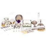 A MIXED COLLECTION OF SILVER to include teaspoons, two circular picture frames the largest 14.5cm