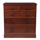 AN EARLY VICTORIAN MAHOGANY CHEST OF TWO SHORT AND THREE LONG DRAWERS with turned knob handles and