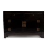 A CHINESE BLACK LACQUERED SIDEBOARD with two short drawers above two panelled doors, raised on stile