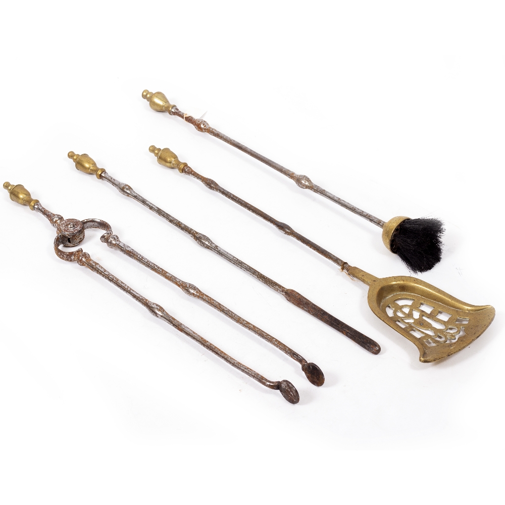 A MATCHED GROUP OF FOUR 19TH CENTURY STEEL AND BRASS FIRE IRONS to include a shovel, poker,