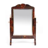 AN EARLY 20TH CENTURY TORTOISE SHELL MOUNTED DRESSING TABLE MIRROR with bevelled glass, 27cm wide