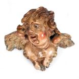 AN 18TH/19TH CENTURY ITALIAN NEAPOLITAN CRECHE CHERUB DOLL polychrome paint over clay, having glass