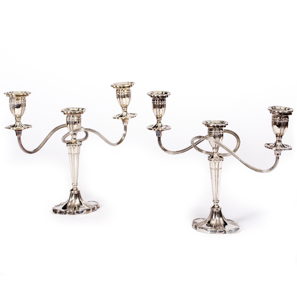 TWO SILVER THREE BRANCH CANDELABRA by Albert Edward Jones, one with marks for Birmingham 1969,