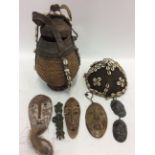 A KENYAN BORANA CALABASH CONTAINER woven cane work and leather decorated with cowrie shells, 32.