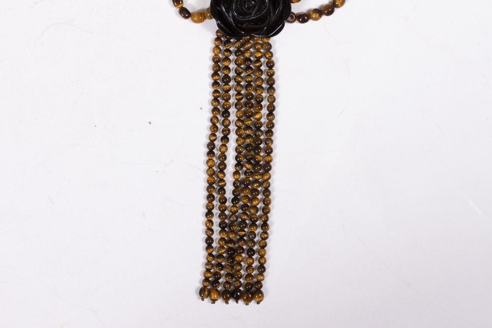 A TIGERS EYE BEAD NECKLACE with a rose pendant, 4cm diameter Condition: in good condition - Image 4 of 4