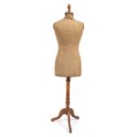 AN EARLY 20TH CENTURY MANNEQUIN ON STAND the mannequin size 42, 164cm in height overall Condition: