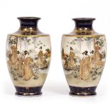 A PAIR OF EARLY 20TH CENTURY JAPANESE SATSUMA WARE VASES with a cobalt blue ground and gilded