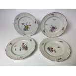 A SET OF FOUR 18TH CENTURY NIDERVILLER PORCELAIN PLATES with basket weave moulded borders and