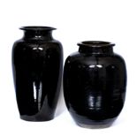 A BLACK GLAZED ORIENTAL VASE 19cm wide x 36cm high together with a smaller Oriental black glazed