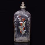 AN 18TH CENTURY ENAMELLED GLASS BOTTLE of Stiegel type having a pewter top with a stopper in the