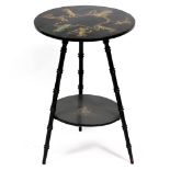 AN EARLY 20TH CENTURY EBONISED OCCASIONAL TABLE with hand painted dancing maiden decoration, a