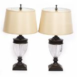 A PAIR OF CONTEMPORARY PAINTED METAL AND GLASS LAMPS of urn form, each with cream shades, 82cm