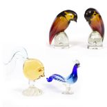 A NEAR PAIR OF LARGE MURANO SALVIATI AMBER AND CLEAR GLASS BIRDS one 27cm in height, the other