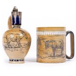 A DOULTON LAMBETH JUG by Hannah Barlow, having a silver top and decorated with goats, 10cm wide x