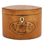 A GEORGE III SATINWOOD TEA CADDY of navette form with inlaid decoration, 15cm wide x 8.5cm deep x