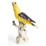 A LATE 19TH / EARLY 20TH CENTURY MEISSEN PORCELAIN FIGURINE 'Golden Oriole' with blue crossed swords