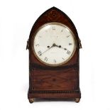 A REGENCY MAHOGANY AND BRASS INLAID BRACKET CLOCK by Webster of London, with a double fusee brass
