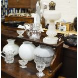 A LATE 19TH / EARLY 20TH CENTURY WHITE GLASS OIL LAMP 35cm in height, three oil lamp shades, a small