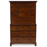 A 19TH CENTURY MAHOGANY CHEST ON CHEST with two short and six long drawers, with brass swan neck
