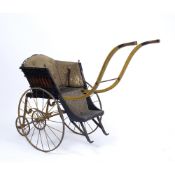 AN EARLY VICTORIAN IRON PAINTED WOOD AND WICKER CHILD'S PRAM with spoked 'Penny Farthing' type